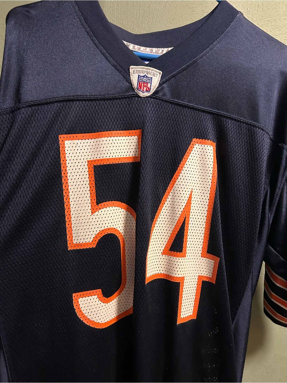 Reebok Navy Football Jersey with White and Orange #54 Urlacher. NFL